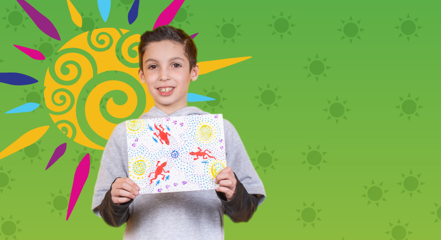Happy camper showing lizard project at Crayola Imagine Arts Academy camp in Oakland County
